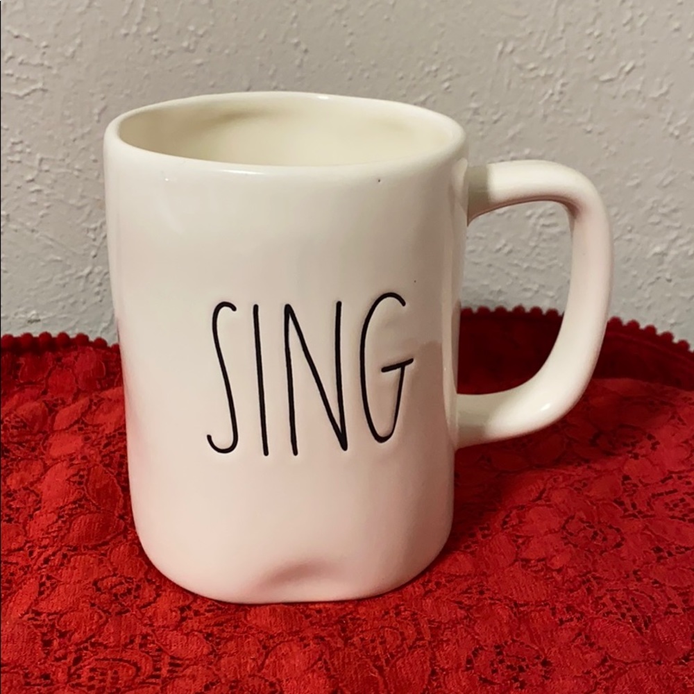 Rae Dunn mug with “Sing” text